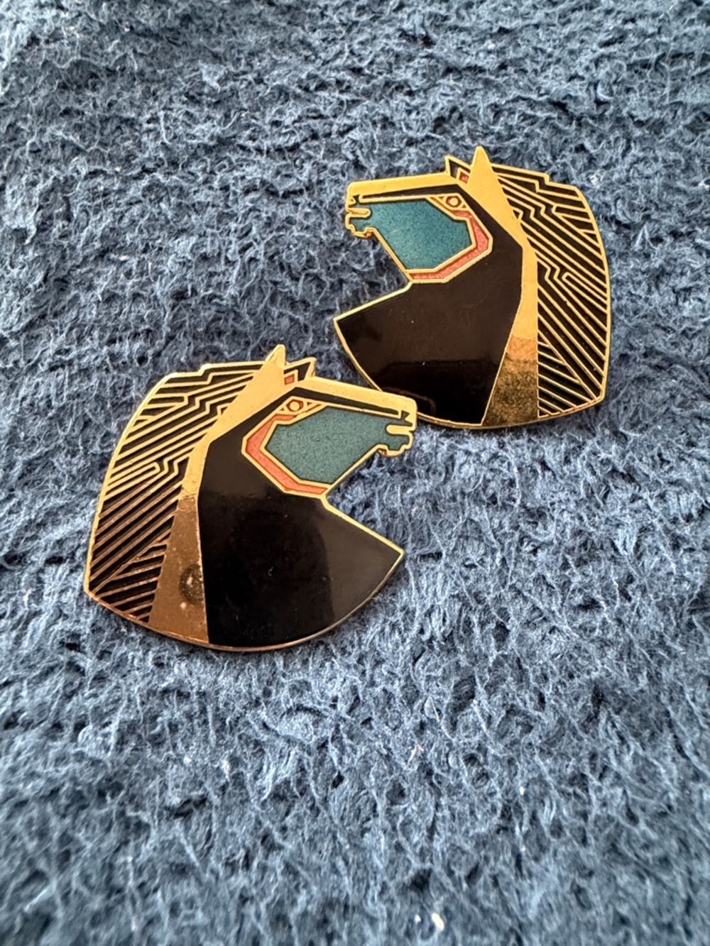 A vintage cloisonné earring from the "Wild Stallion"  by designer Laurel Burch